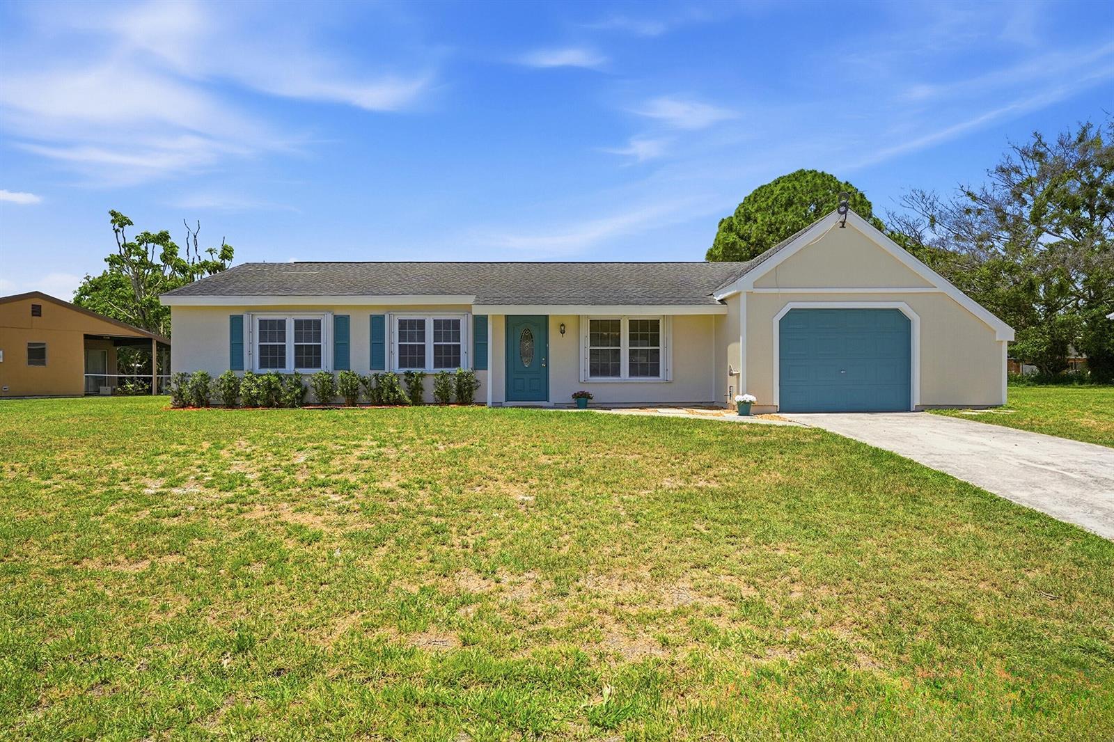 450 SW Kentwood Road, Port St. Lucie FL 34953