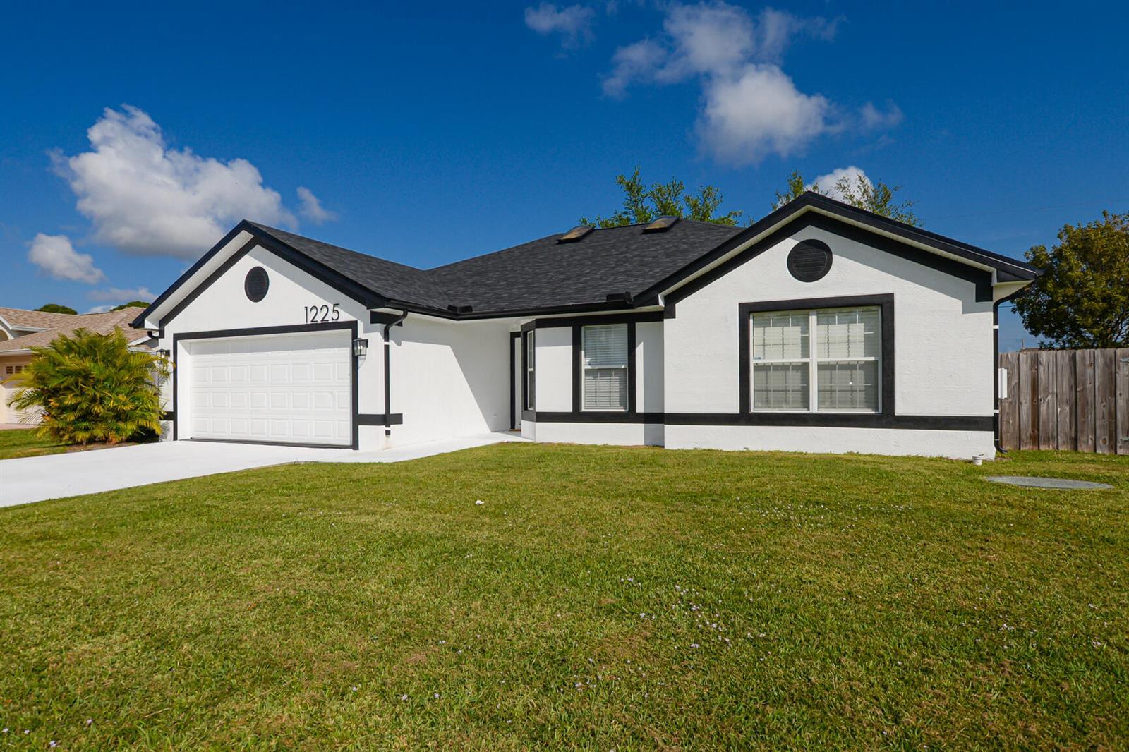 1225 SW Hunnicut Avenue, Port St. Lucie FL 34953 photo 2