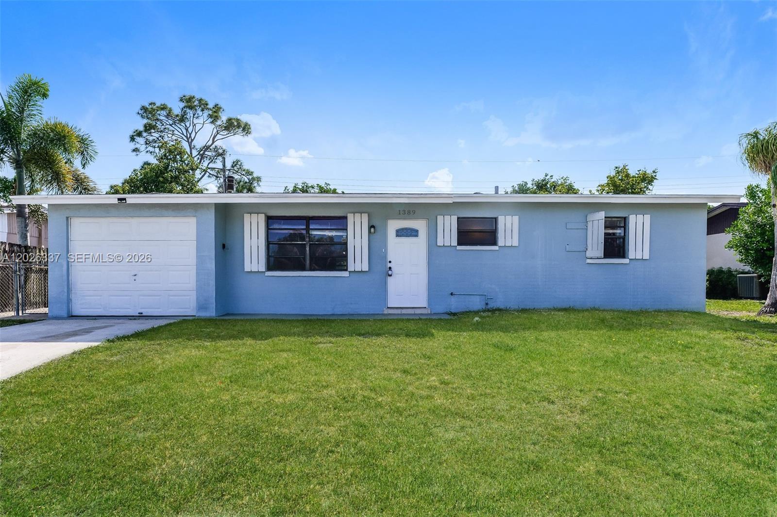 1389 Meadowbrook Dr, West Palm Beach FL 33417