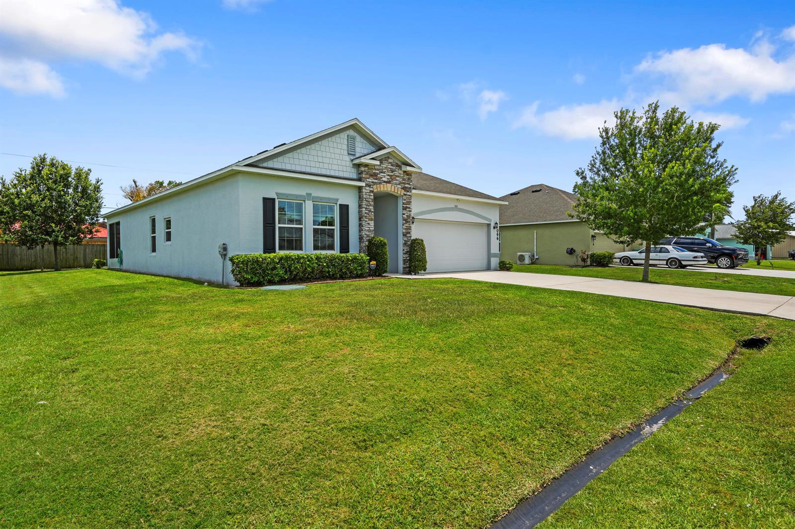 1066 SW John Maccormack Terrace, Port St. Lucie FL 34953 photo 2