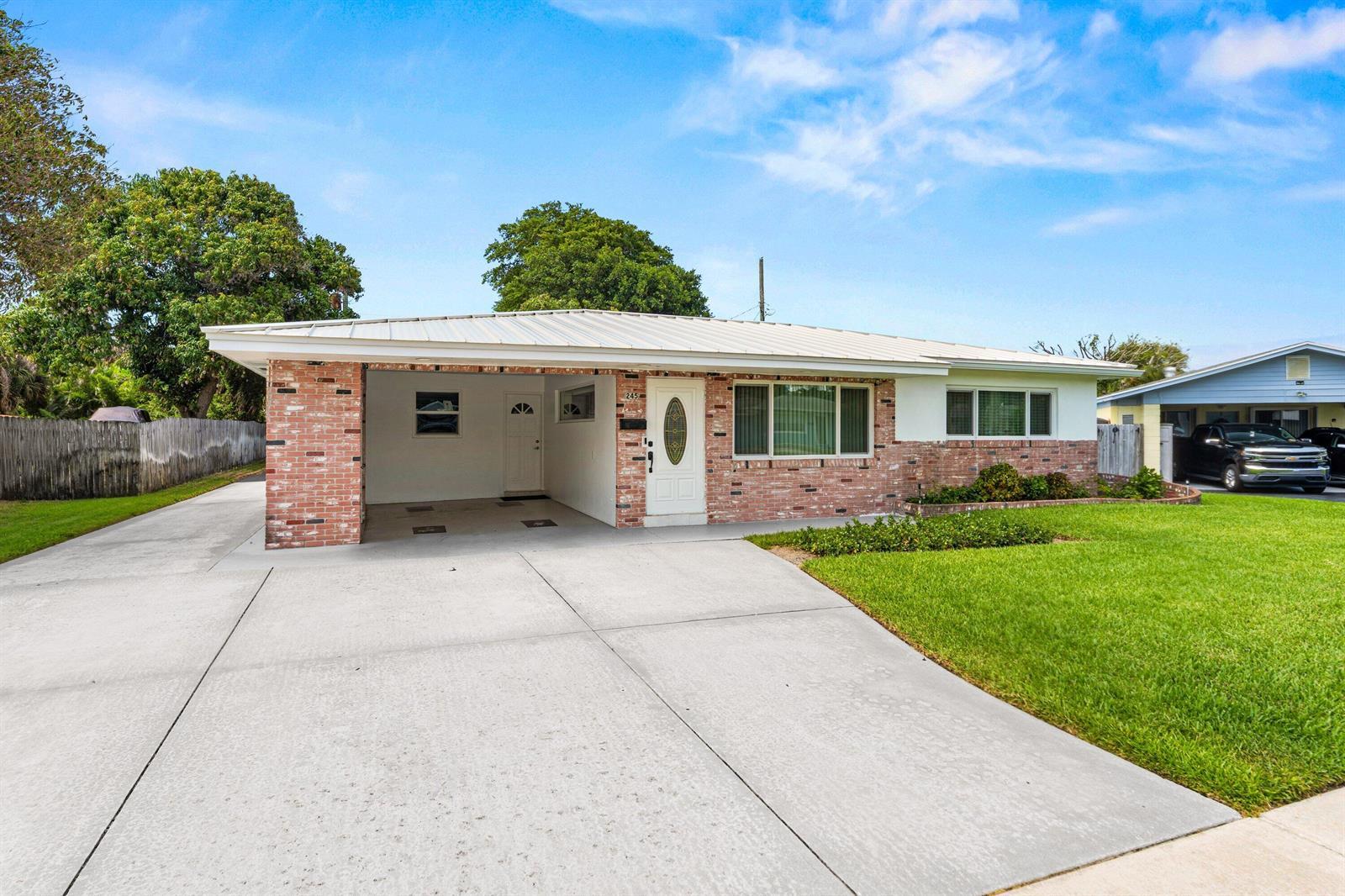 245 Greenbriar Drive, Lake Park FL 33403 photo 2