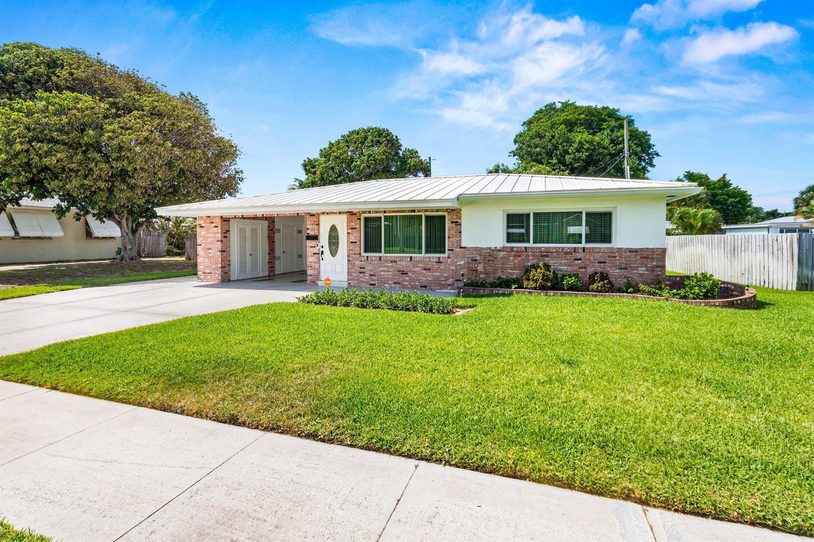 245 Greenbriar Drive, Lake Park FL 33403 photo 3