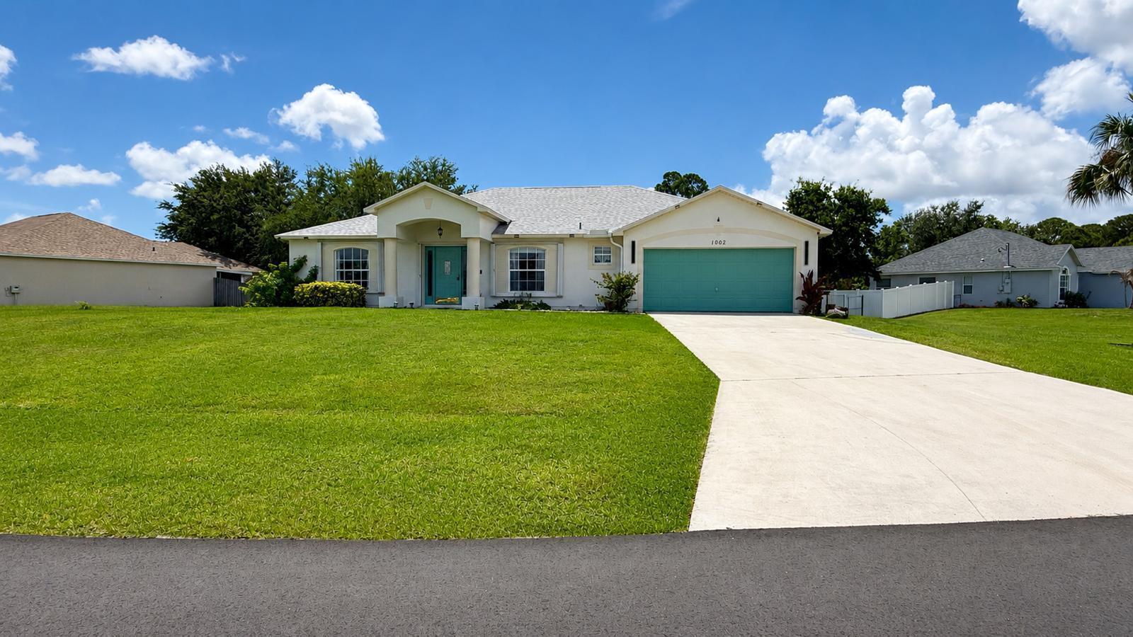 1002 SW Longfellow Road, Port St. Lucie FL 34953