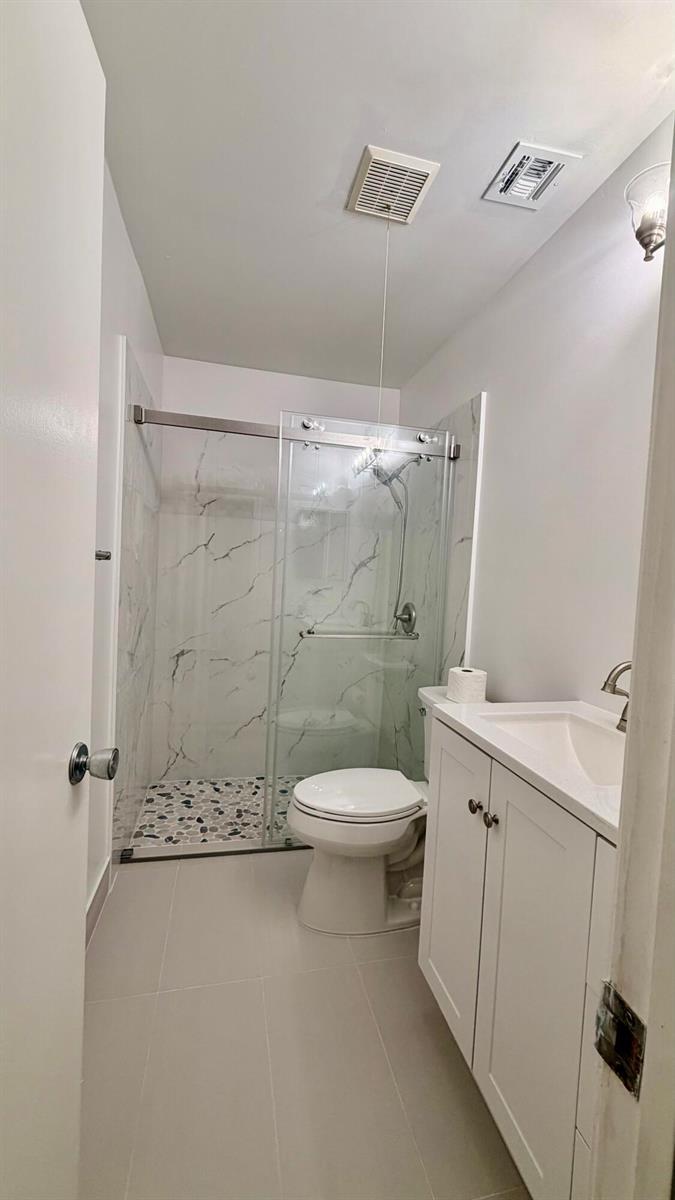 9121 E Highland Pines Drive, Palm Beach Gardens FL 33418 photo 3