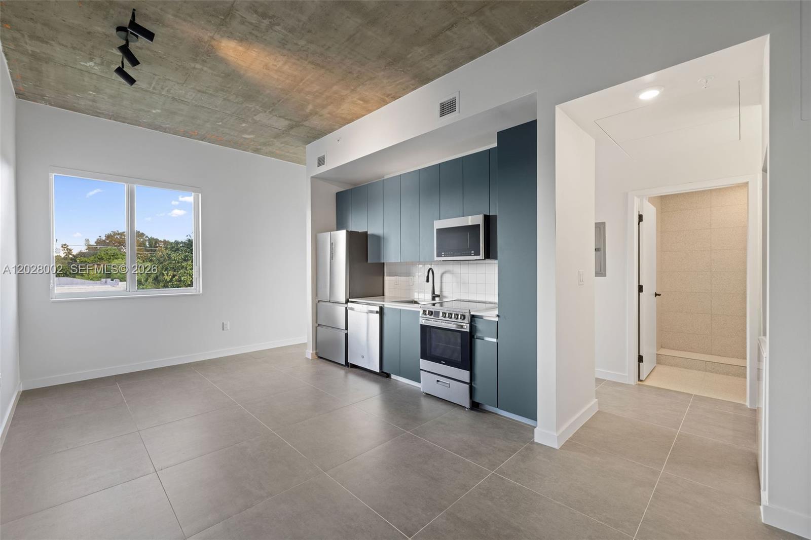 315 NW 32 ST # 306, Miami FL 33127 photo 2