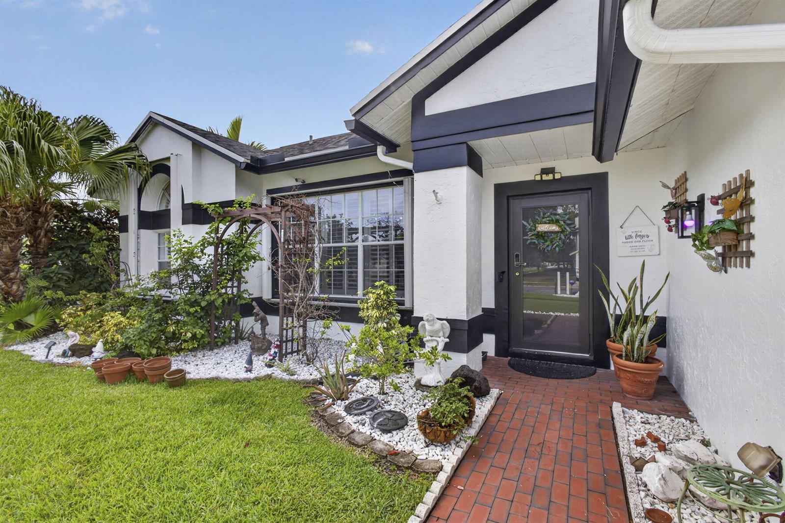 102 E Royal Pine Cir, Royal Palm Beach FL 33411 photo 2