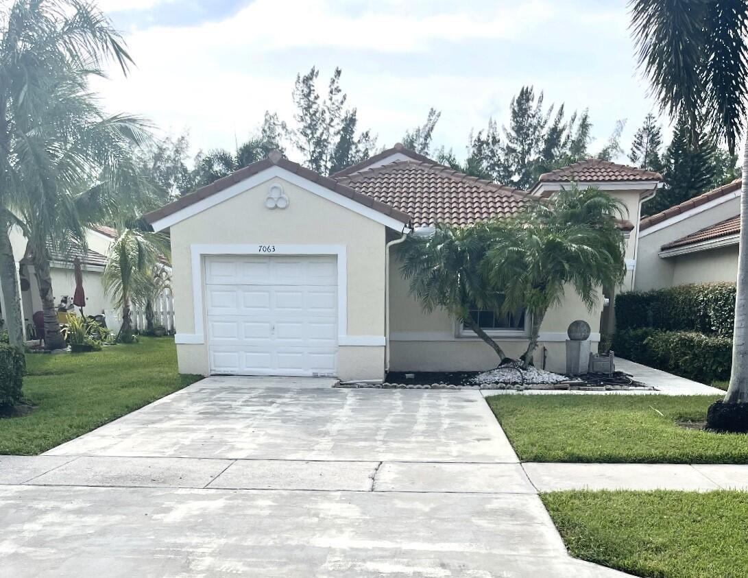 7063 Burgess Drive, FL 33467
