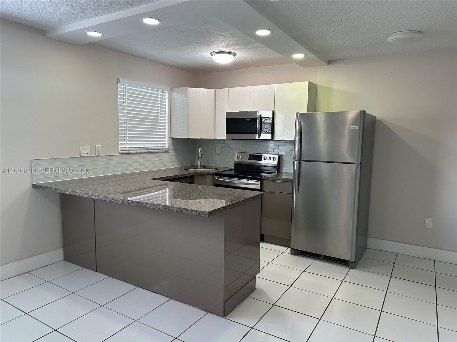 1975 NE 135th St # 3E, North Miami FL 33181 photo 2