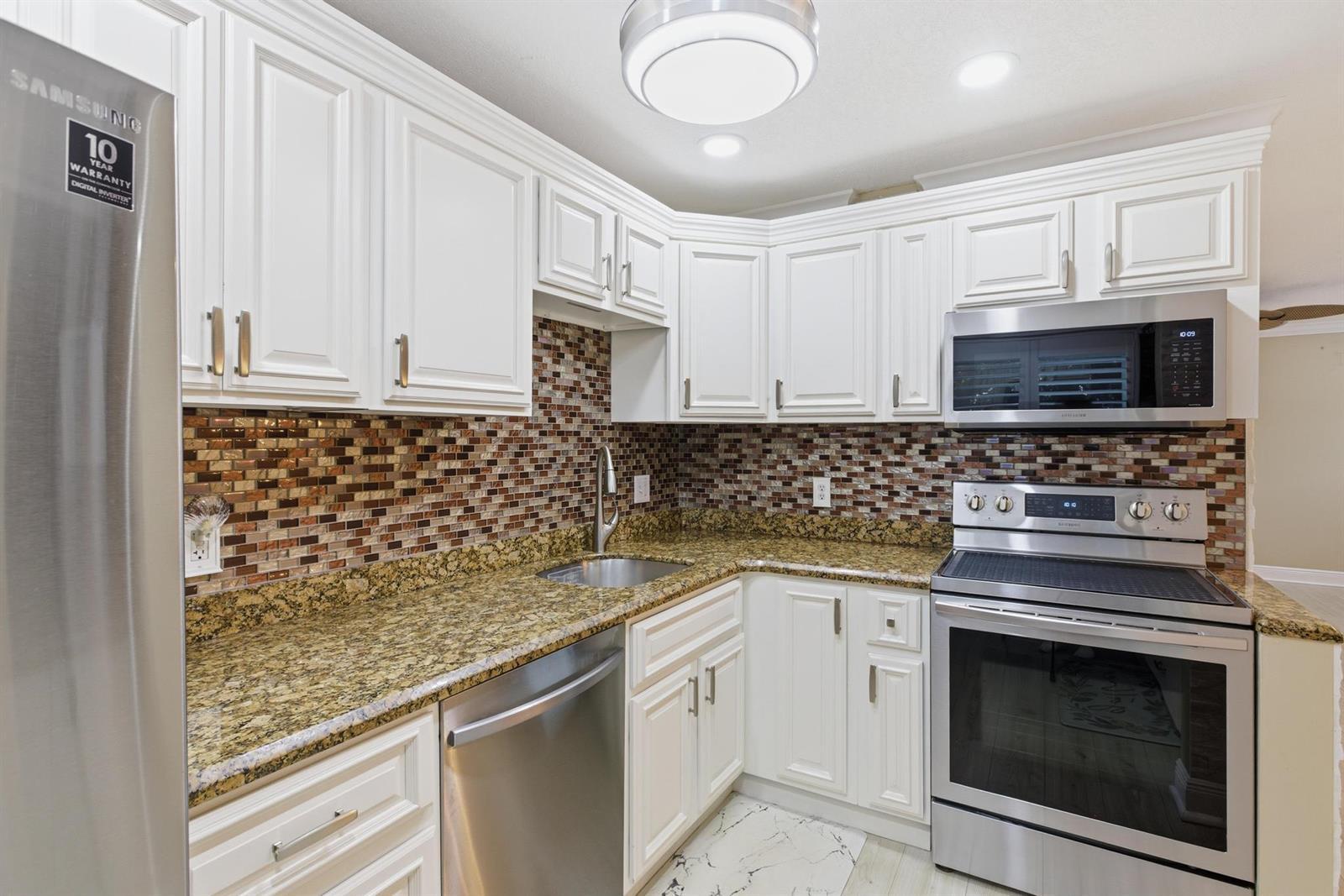 34 Colonial Club Drive # 101, Boynton Beach FL 33435 photo 3