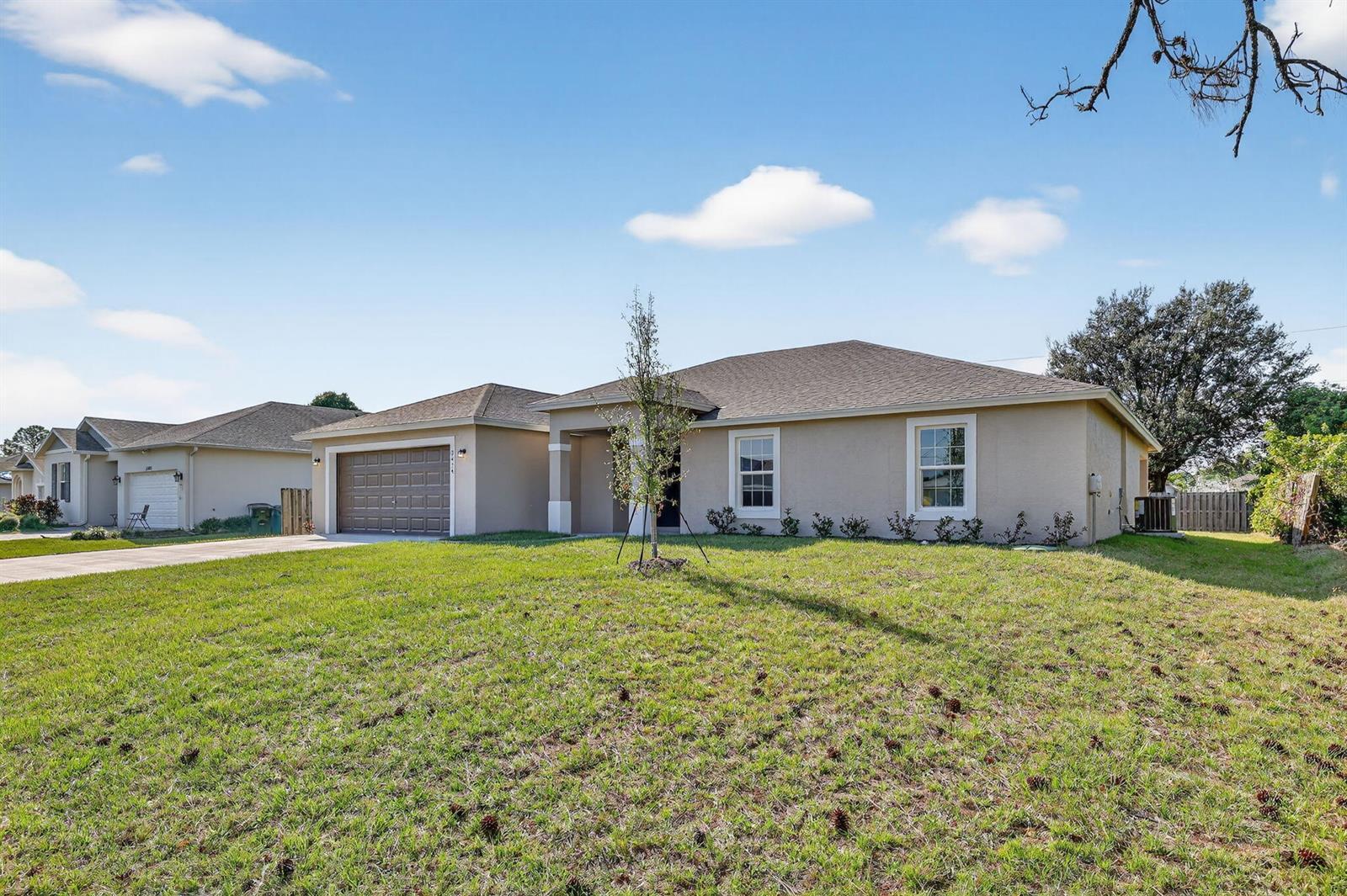1267 SW Edinburgh Drive, Port St. Lucie FL 34953 photo 2