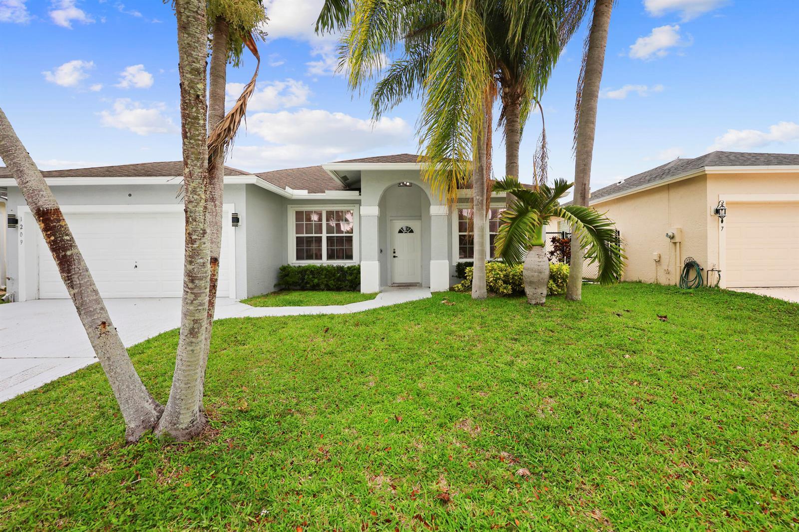 1209 Olympic Circle, FL 33413 photo 4