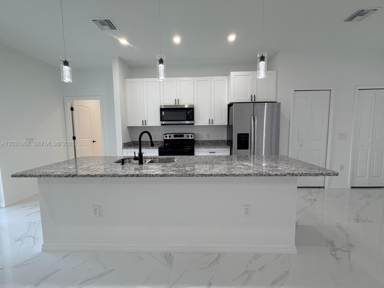 2706 72nd St W, Lehigh Acres FL 33971 photo 5