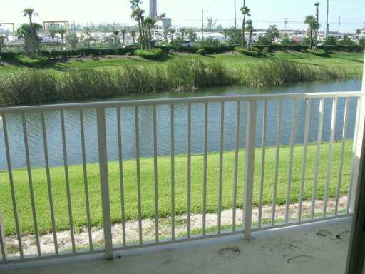 1049 Golden Lakes Boulevard # 122, West Palm Beach FL 33411 photo 2