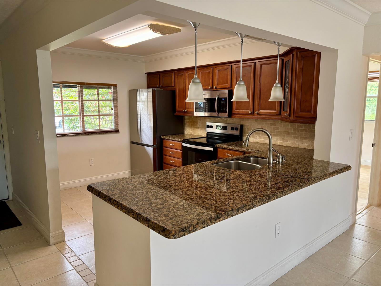 4040 Crystal Lake Drive # 101, Pompano Beach FL 33064 photo 2