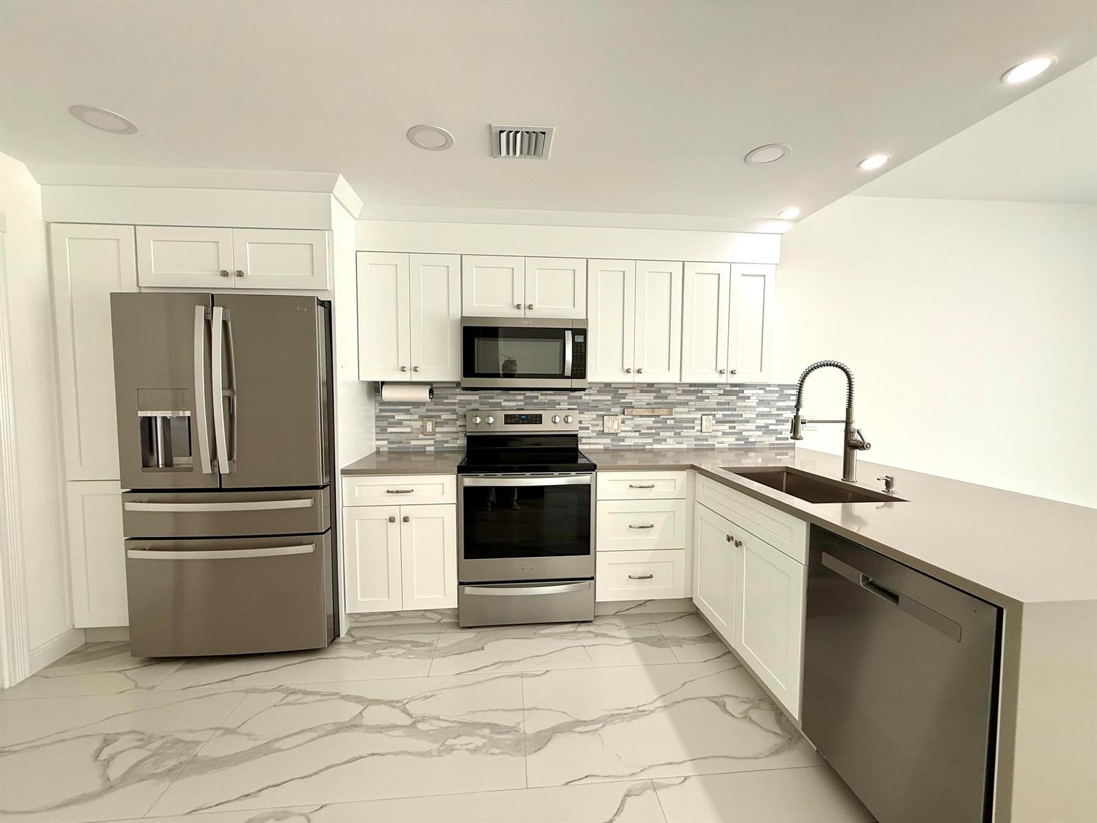 117 Waterford Drive, Jupiter FL 33458 photo 2