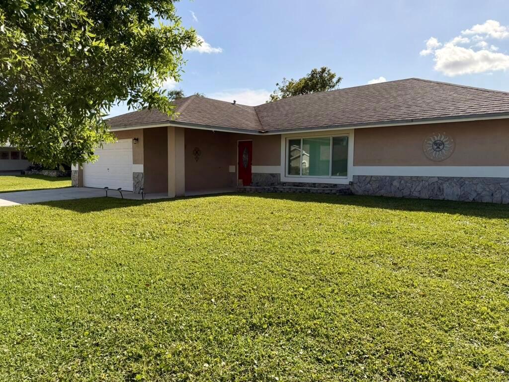 147 Sunflower Circle, Royal Palm Beach FL 33411 photo 3