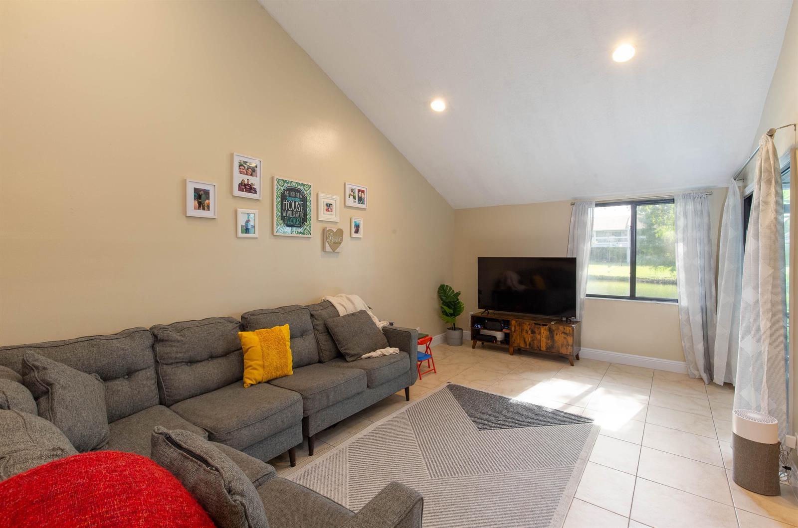 1599 Woodbridge Lakes Circle, West Palm Beach FL 33406
