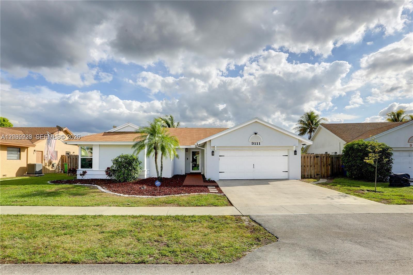 3111 NW 107th Dr, Sunrise FL 33351 photo 2