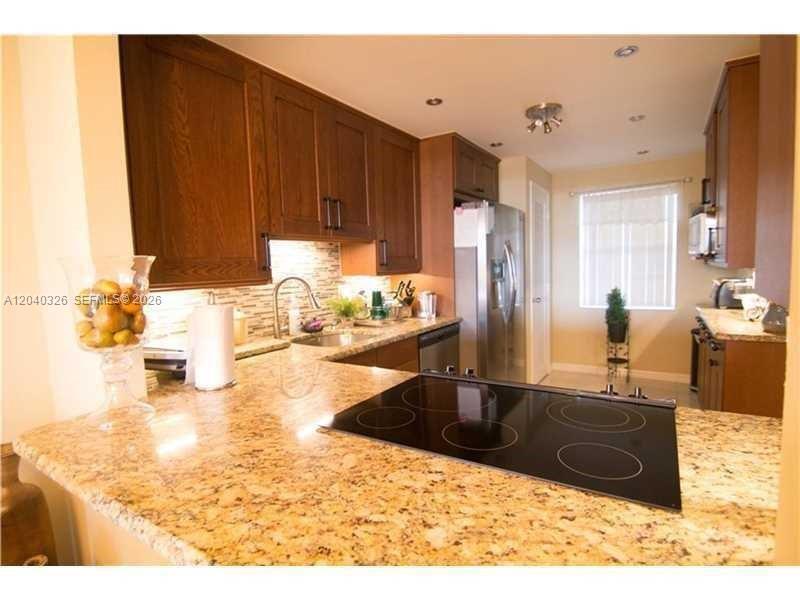 4030 W Palm Aire Dr # 505, Pompano Beach FL 33069