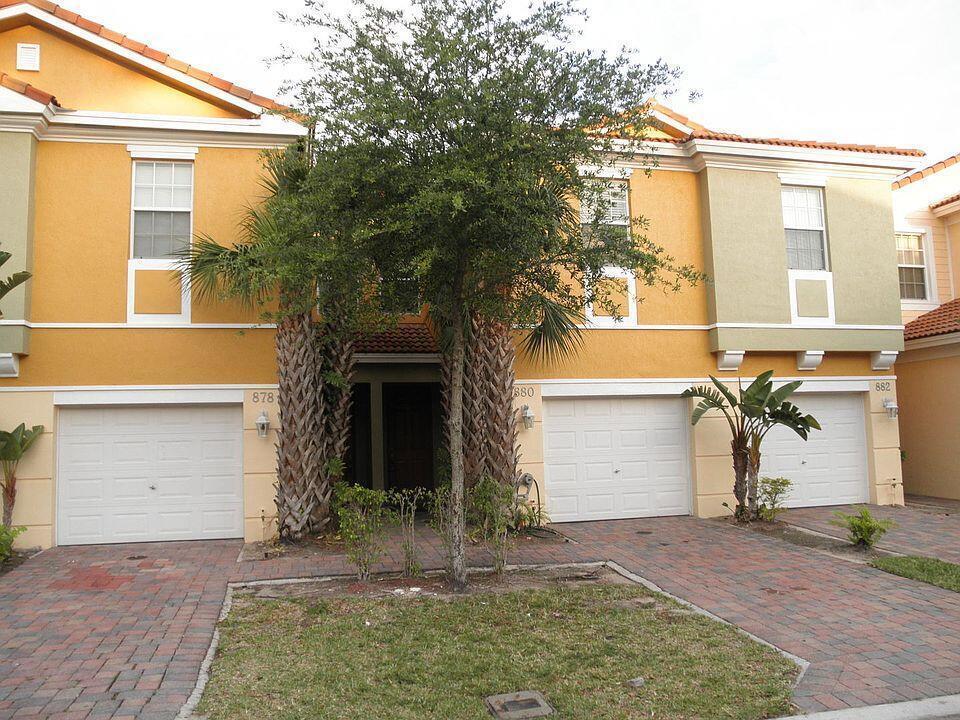 880 Pipers Cay Drive, West Palm Beach FL 33415