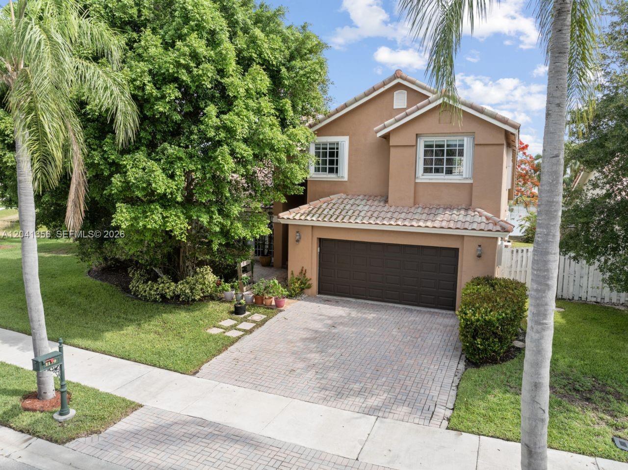 1179 Laguna Springs Dr, Weston FL 33326 photo 2