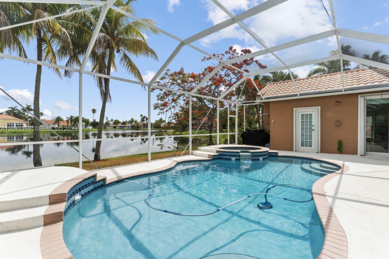 1179 Laguna Springs Dr, Weston FL 33326