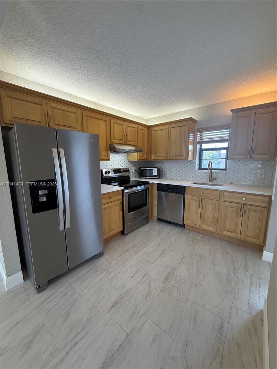 9273 SW 8th St # 311, Boca Raton FL 33428 photo 2