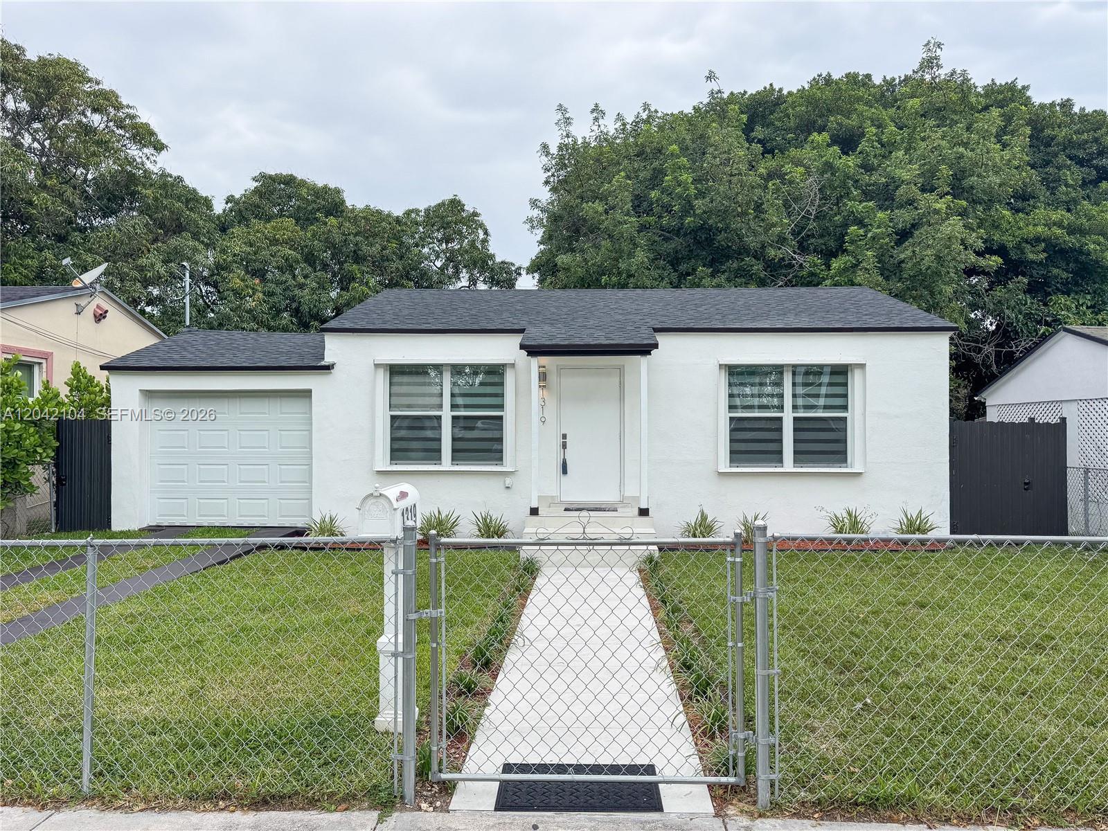 1319 NW 40th St, Miami FL 33142 photo 2