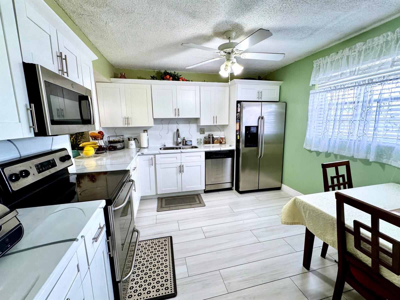4930 E Sabal Palm Boulevard # 107, Tamarac FL 33319 photo 5