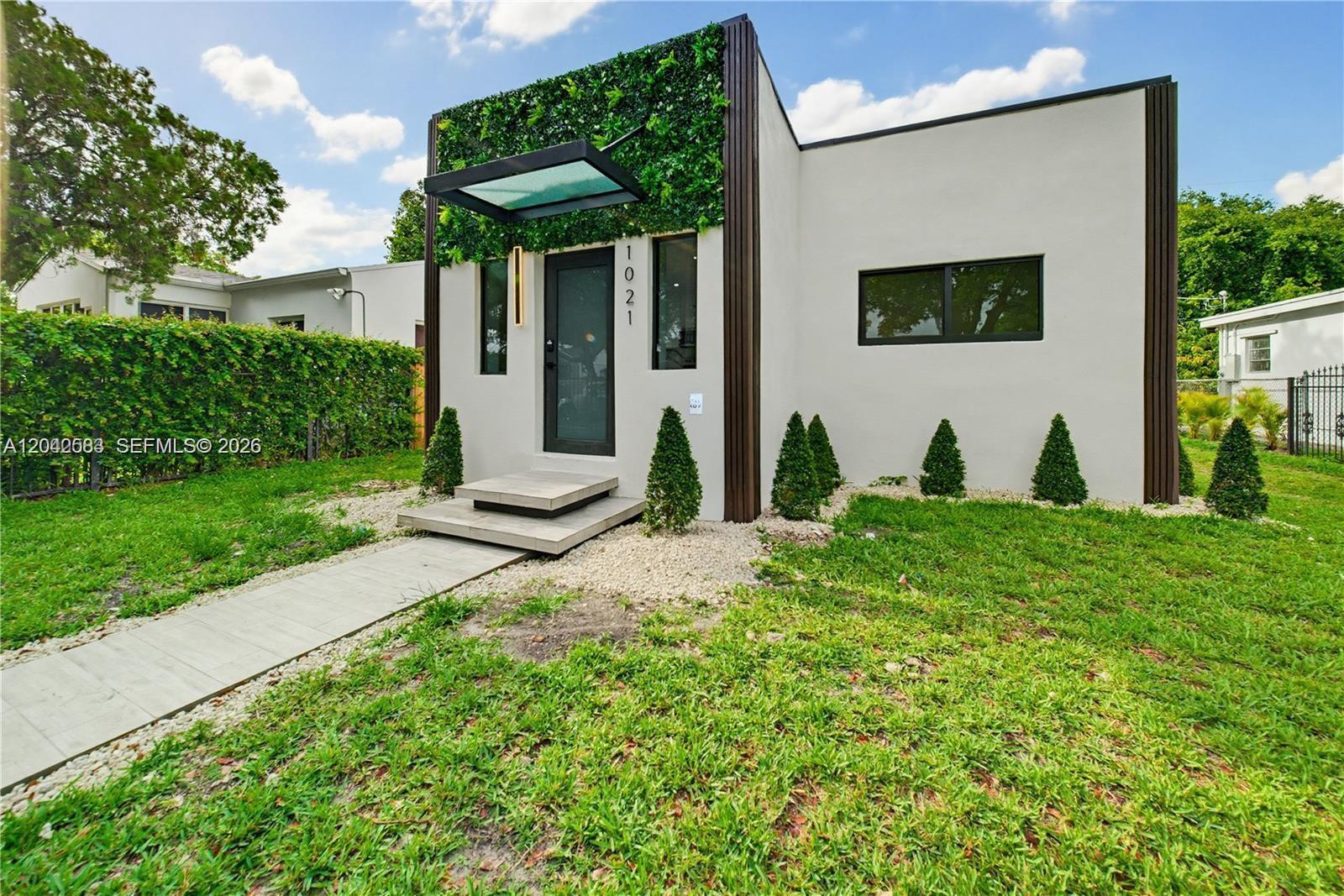 1021 NW 48th St, Miami FL 33127 photo 2