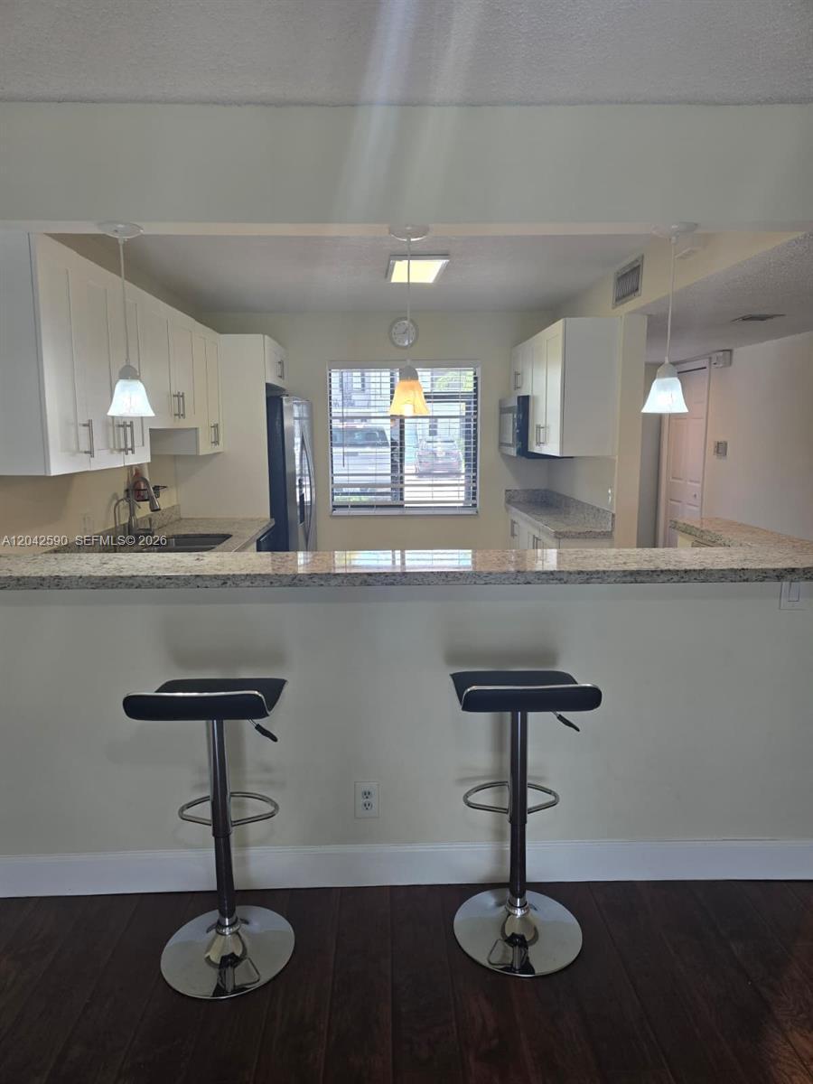 16581 Blatt Blvd # 104, Weston FL 33326