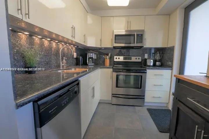 301 Golden Isles Dr # 109, Hallandale Beach FL 33009 photo 2