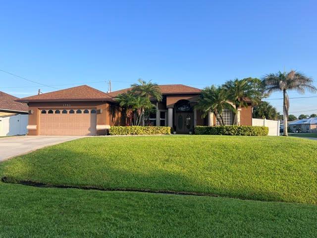 1702 SW Comfort Street, Port St. Lucie FL 34987 photo 2
