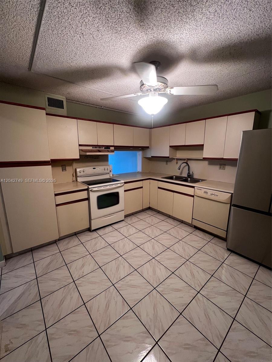 4975 E Sabal Palm Blvd # 304, Tamarac FL 33319 photo 5