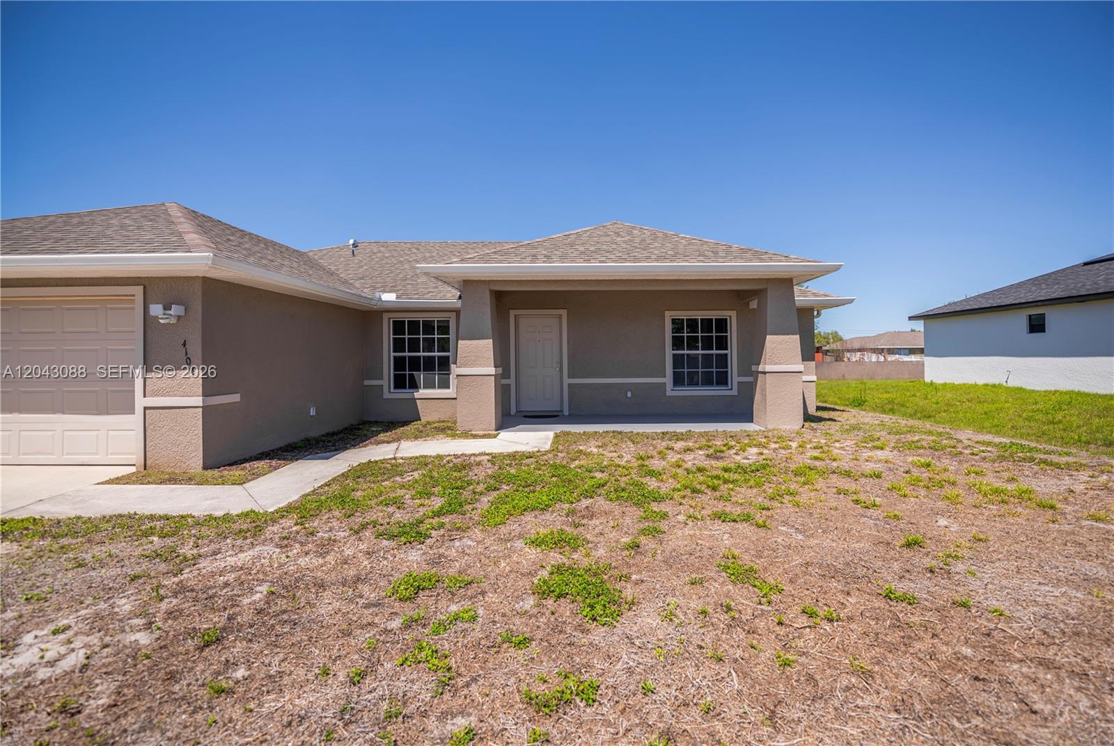 4104 SW 13 th St., Lehigh Acres FL 33976 photo 3