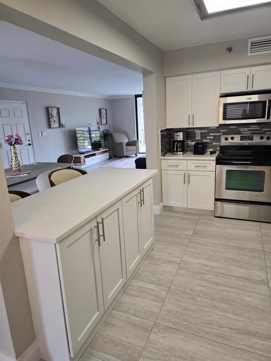 7580 Regency Lake Drive # 402, Boca Raton FL 33433 photo 5
