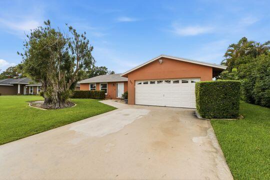 397 La Mancha Avenue, Royal Palm Beach FL 33411 photo 2