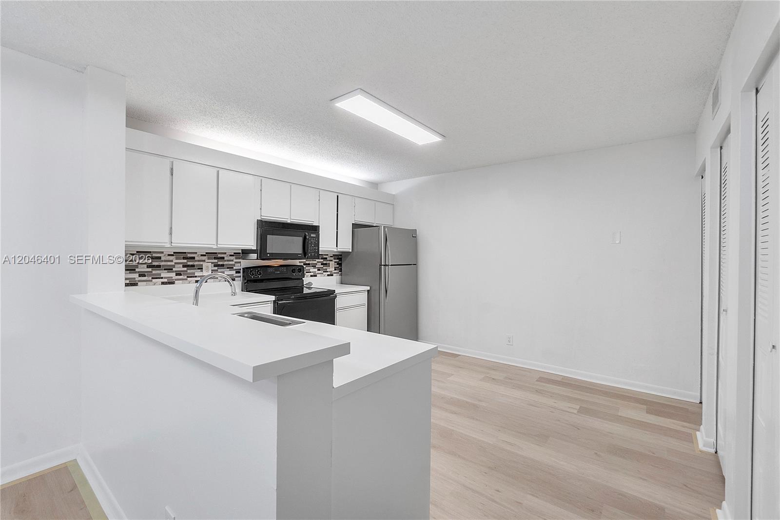 5661 Riverside Dr, Coral Springs FL 33067 photo 5