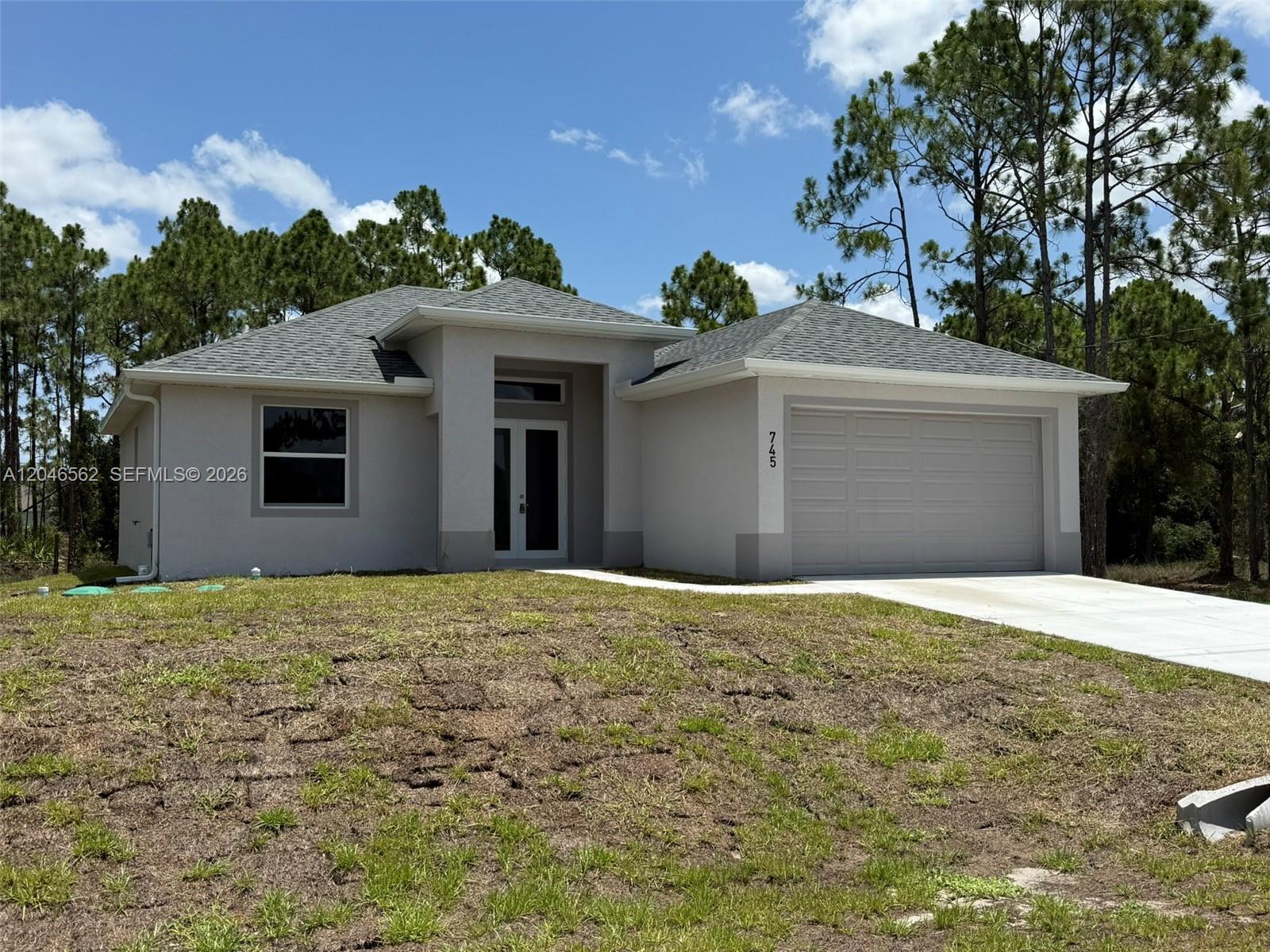 745 Manuel St E, Lehigh Acres FL 33974 photo 2