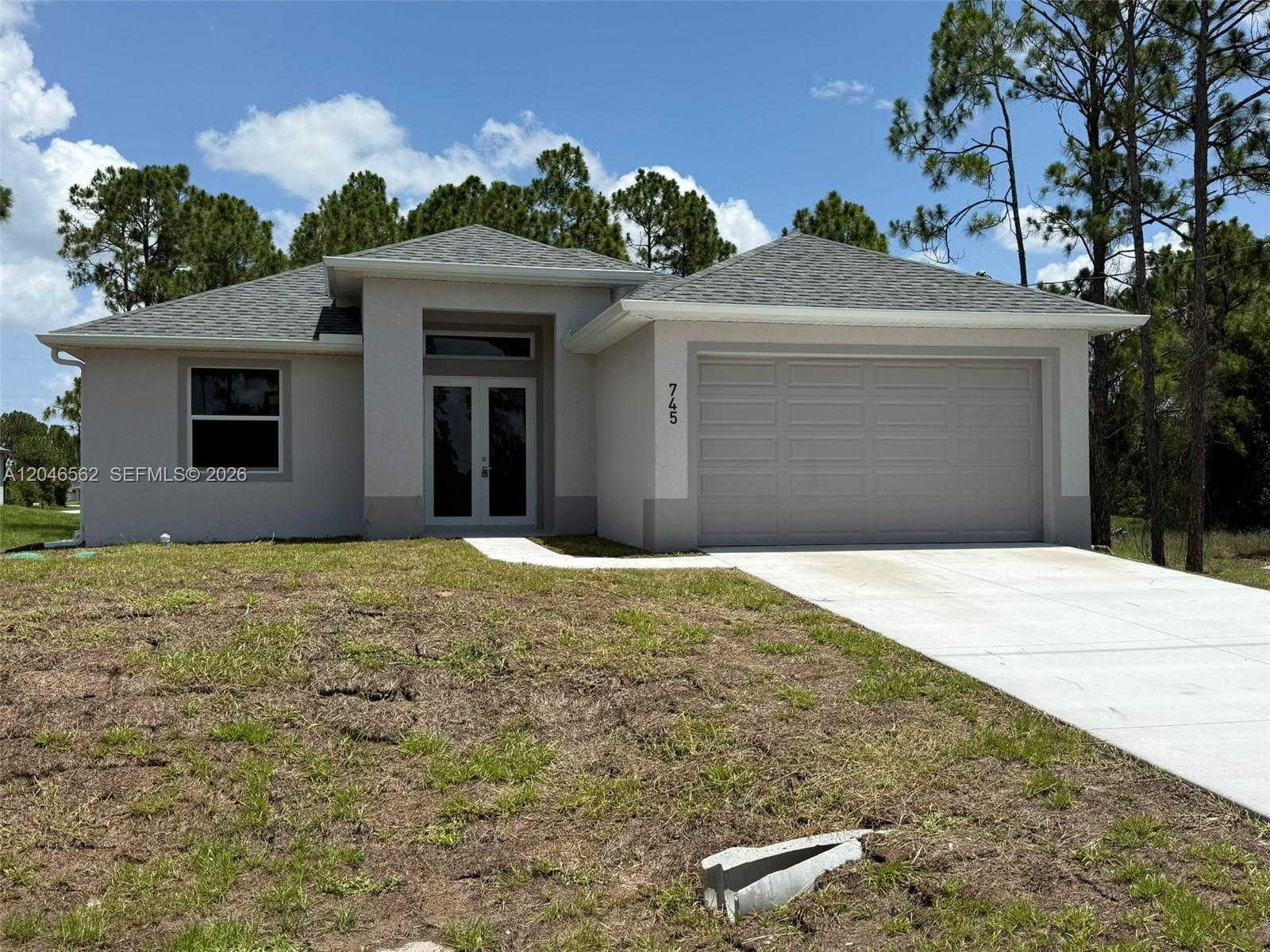 745 Manuel St E, Lehigh Acres FL 33974