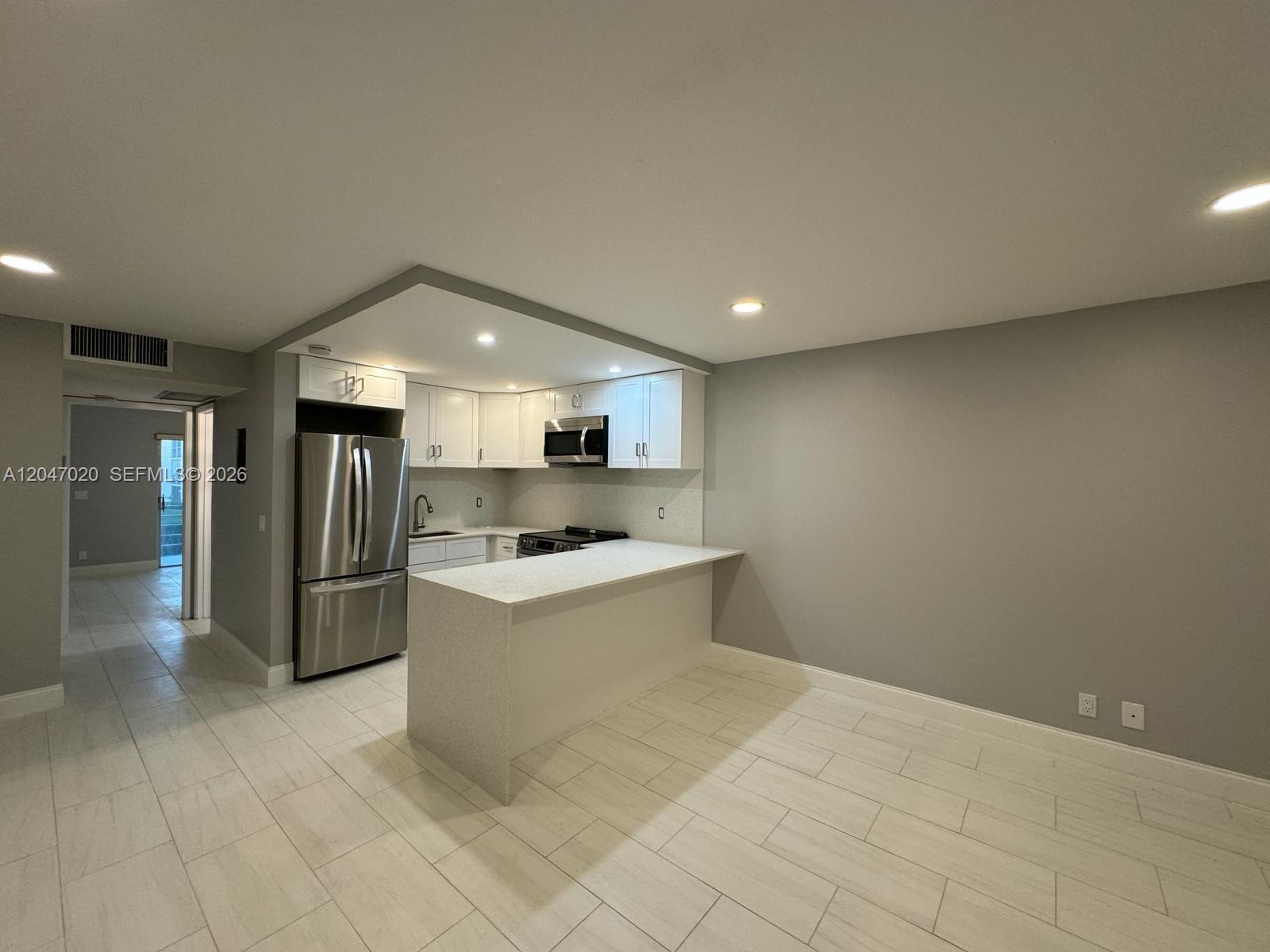500 W Village Green Cir W # 215, Palm Springs FL 33461 photo 2