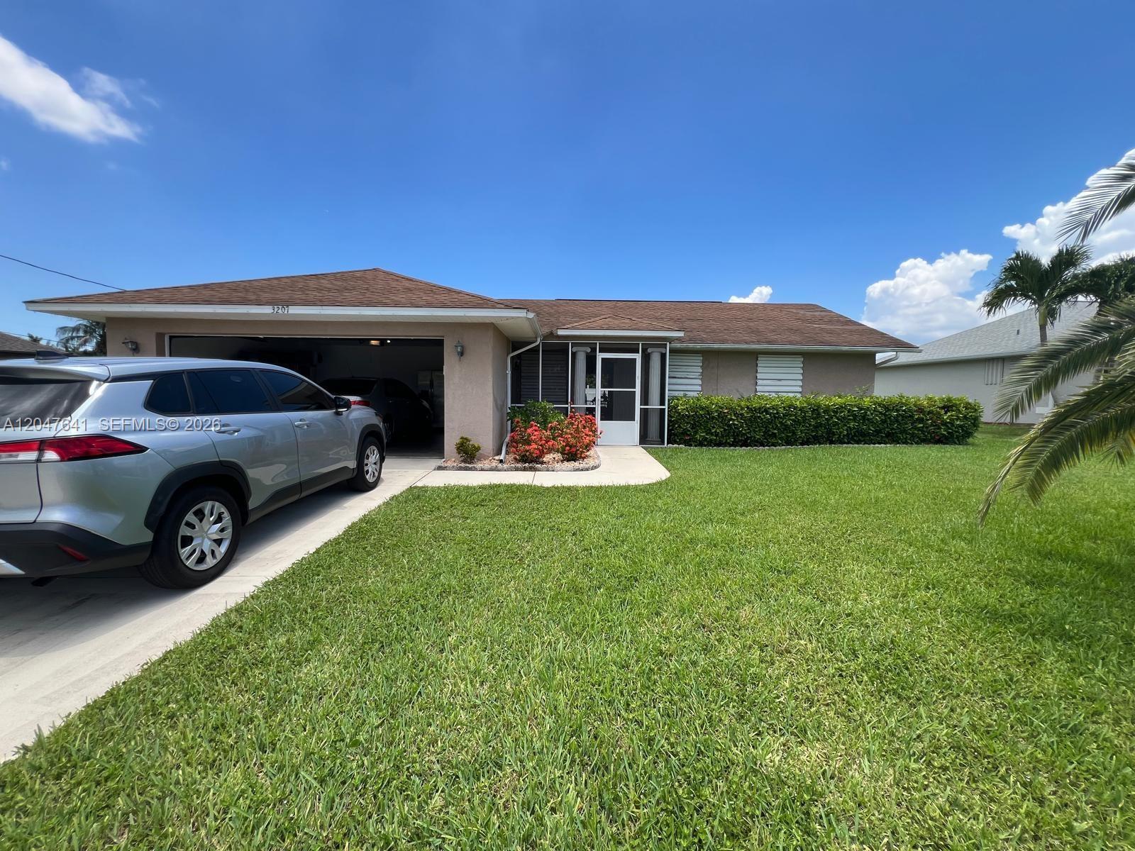 3207 SE 1st PL, Cape Coral FL 33904 photo 2