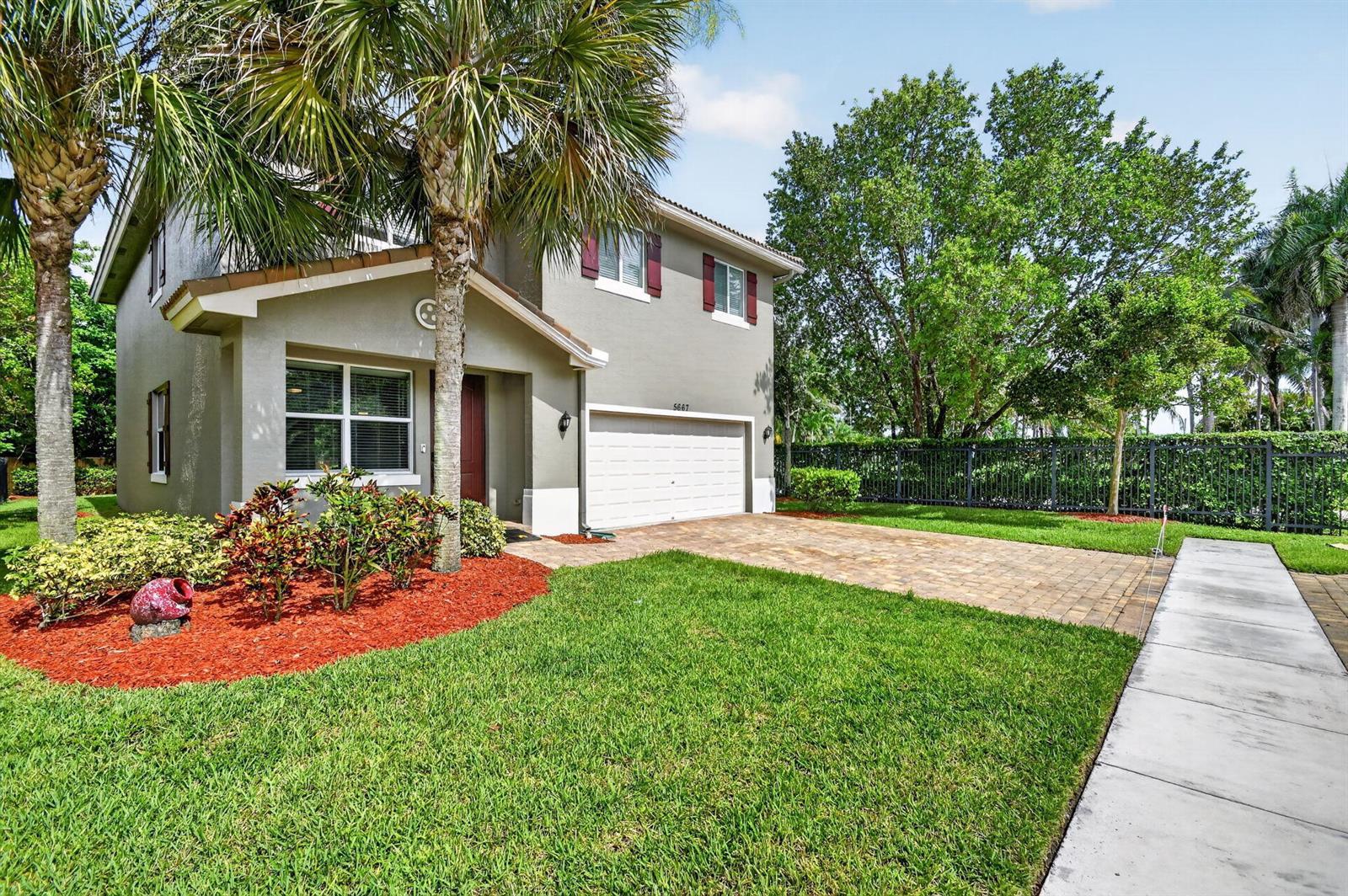 5667 Caranday Palm Drive, FL 33463 photo 2