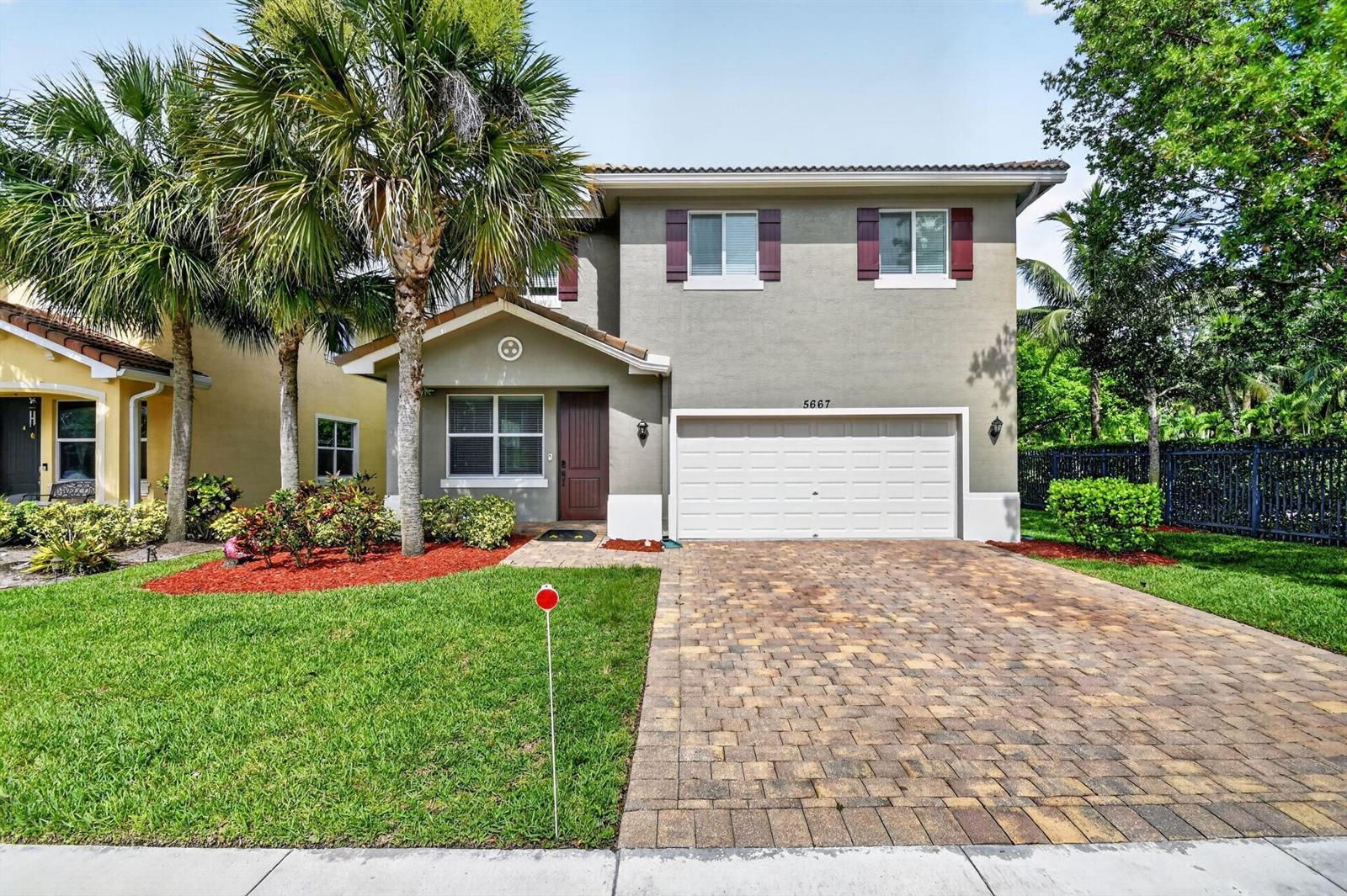 5667 Caranday Palm Drive, FL 33463