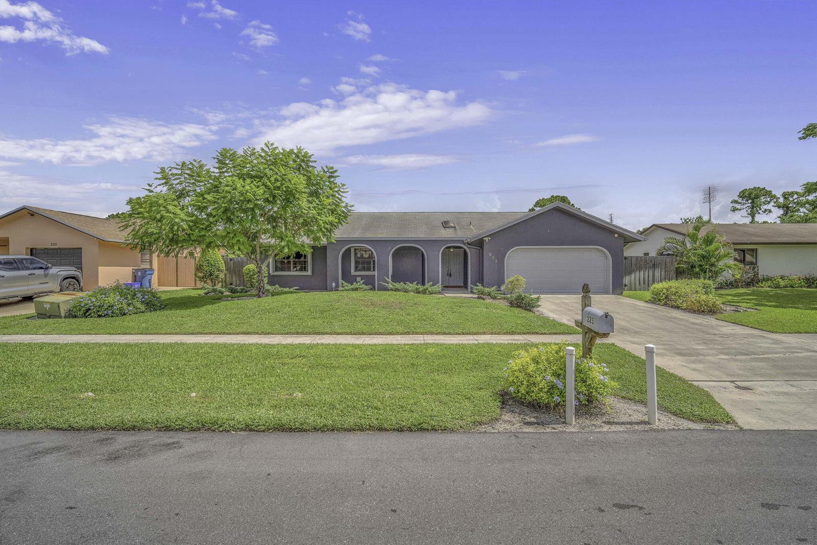 223 Bobwhite Road, Royal Palm Beach FL 33411