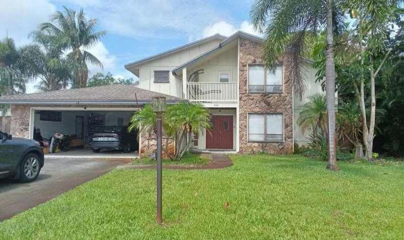 596 Greenwood Drive, Jupiter FL 33458