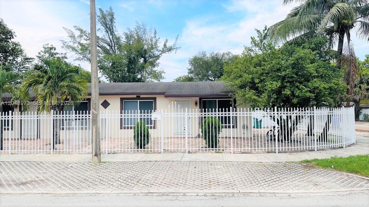 1097 NW 38th St, Miami FL 33127 photo 2