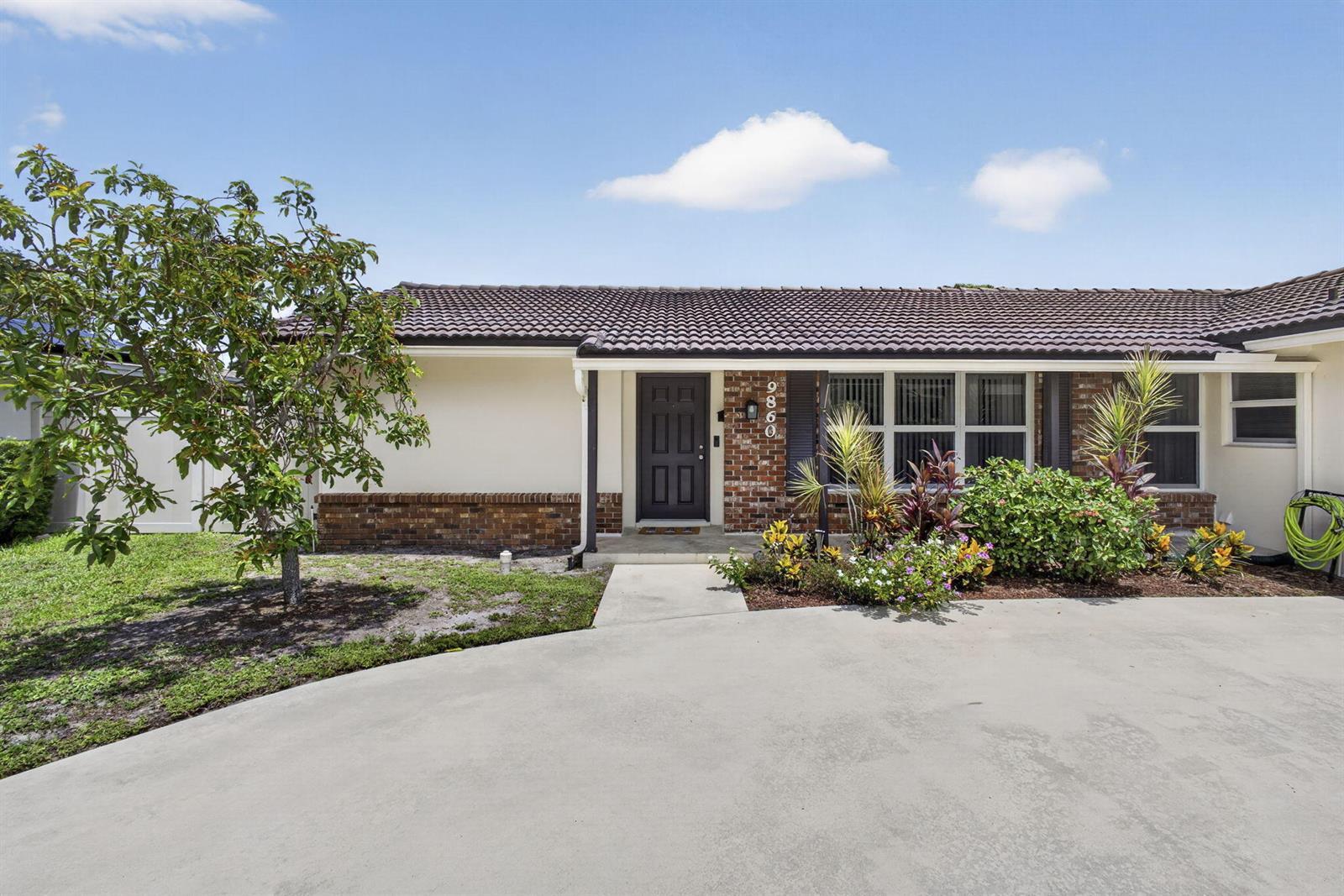 9860 Honeysuckle Avenue, Palm Beach Gardens FL 33410 photo 3