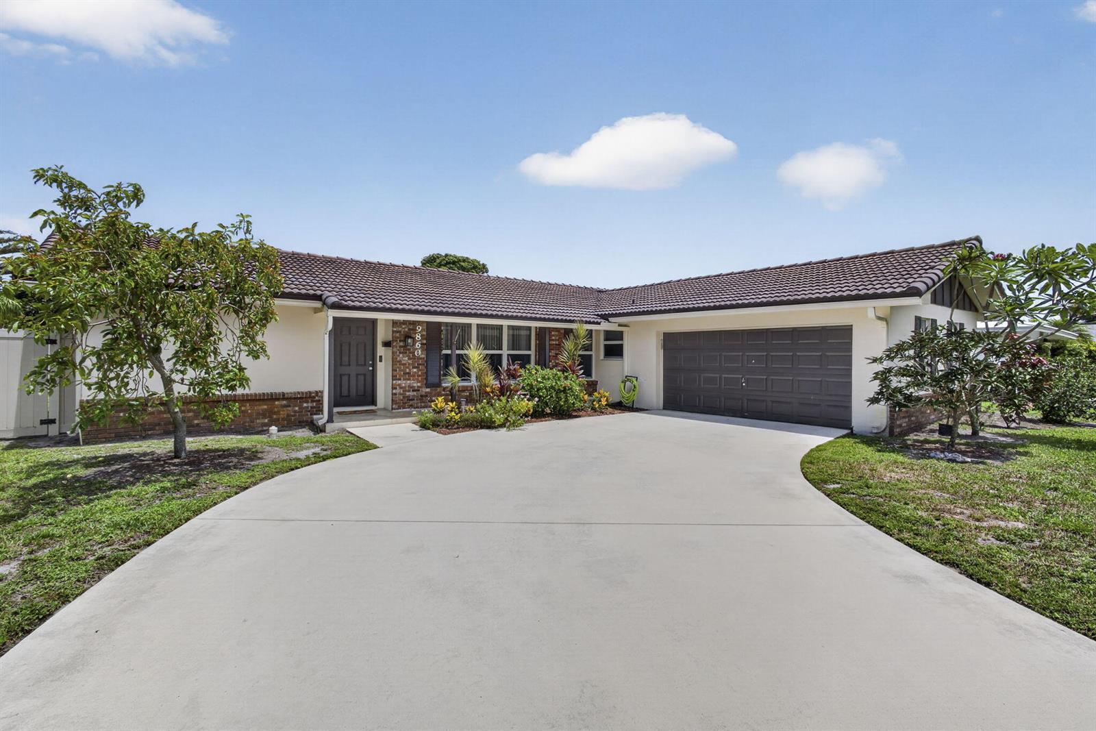 9860 Honeysuckle Avenue, Palm Beach Gardens FL 33410