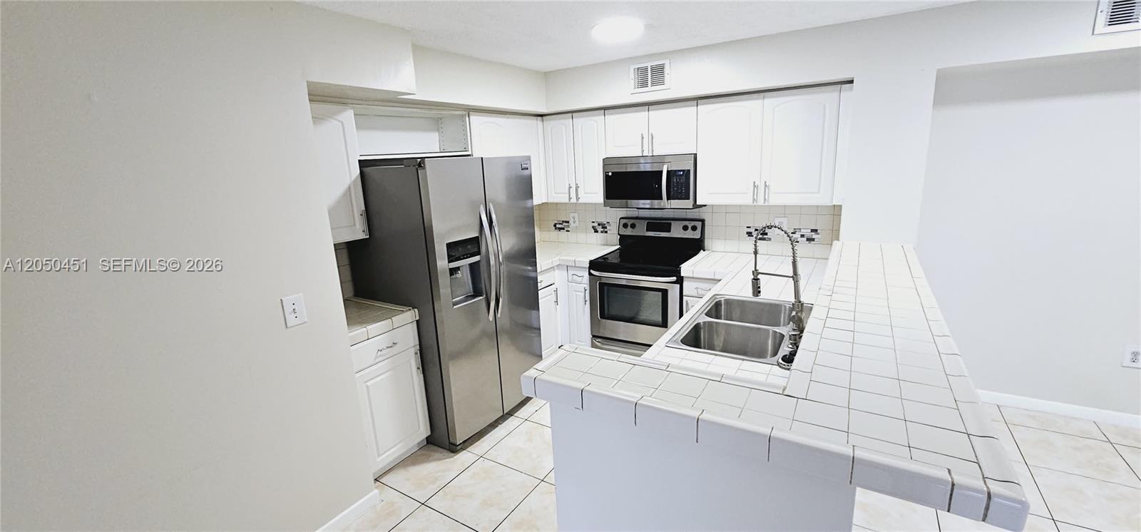 1707 Village Blvd # 208, West Palm Beach FL 33409 photo 2